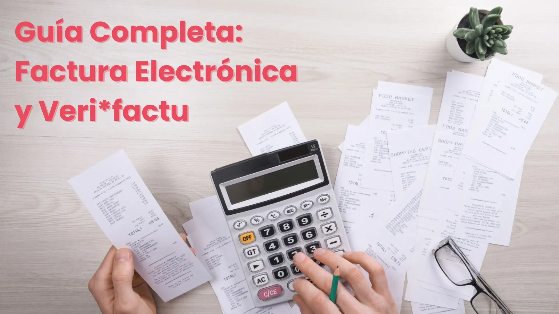 Calculadora y facturas sobre la mesa. En la fábrica nos preparamos para la entrada en vigor de Verifactu